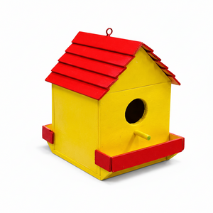Yellow birdhouse with a red roof on a white background