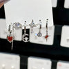 6Pcs Y2K Dark Red Zircon Star Moon Earring Set Gothic Black Butterfly Bow Tassel Earrings Set Kpop Heart Cross Star Earring Sets