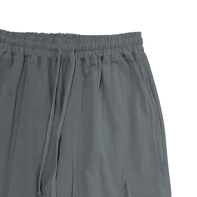 Amazon Cross-Border Cotton and Linen Tied Feet Multi-Pocket Tether Solid Color Loose Drawstring Trousers