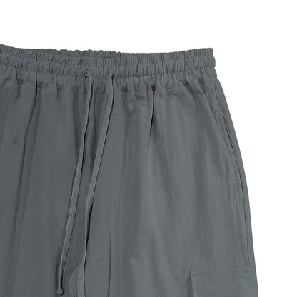 Amazon Cross-Border Cotton and Linen Tied Feet Multi-Pocket Tether Solid Color Loose Drawstring Trousers